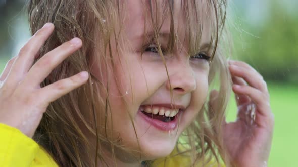 Girl Laughing in Rain