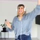 Cheerful woman in headphones listening to music, beautiful girl singing favorite song, dancing - VideoHive Item for Sale