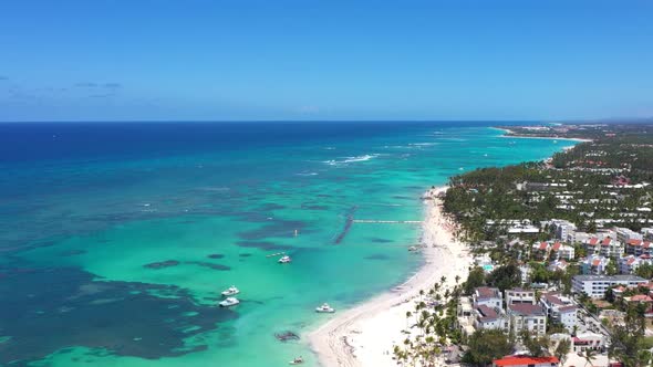 Tropical Seashore with Resorts and Turquoise Caribbean Sea