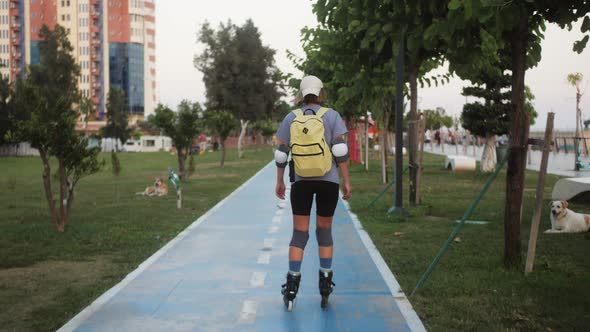 Woman Rolling Skating Outdoors Having Fun Sport