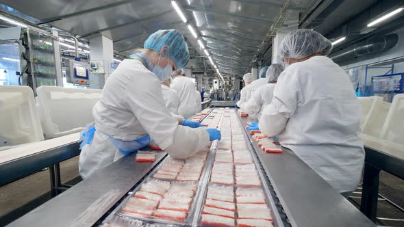 Packaging of Crabs Sticks Carried Out By Female Plant Staff