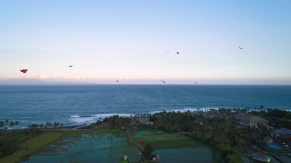 Kites Fly on the Ocean Shore Near the Rice Terraces