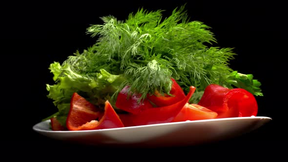 Mixed vegetables on a plate. top view. isolated on white