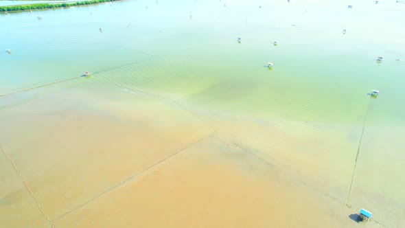 Aerial view from a drone flying over the coast. Lots of Home Krateng on the sea