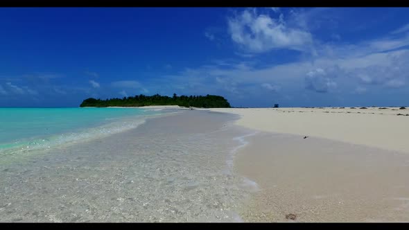 Aerial top view scenery of tropical coastline beach voyage by blue green water and bright sandy back