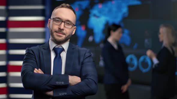 Portrait Confident Business Male Posing with Crossed Hands at Hi Tech Stock Exchange Modern Office