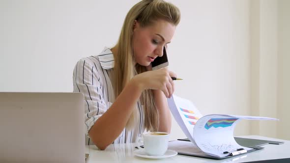 Blonde Business Woman Working at Modern Office