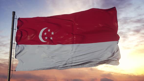 Flag of Singapore Waving in the Wind Against Deep Beautiful Sky at Sunset