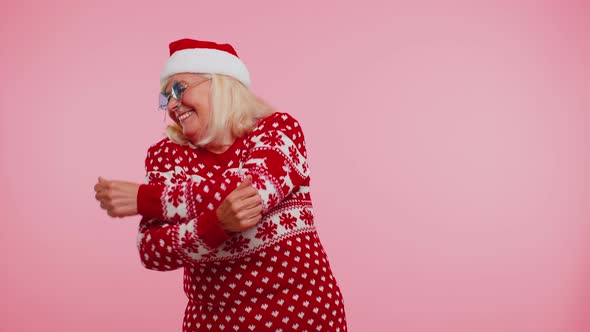 Senior Christmas Grandmother Woman with Deer Antlers Listening Music Dancing Disco Fooling Around
