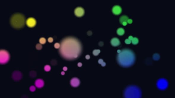 Animation of multi coloured glowing spots of light moving in hypnotic motion on black background alt