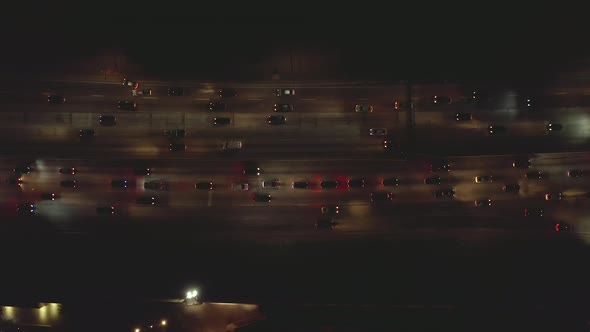 AERIAL: Busy Highway,Traffic Birds View at Night with Car Lights, Los Angeles, California 