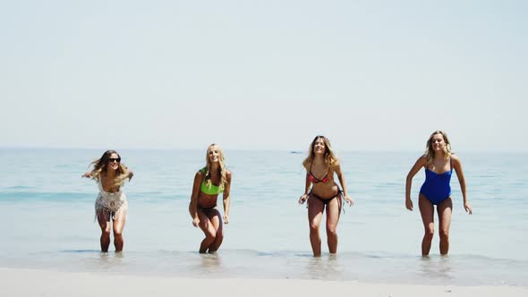 Happy friends having fun at beach