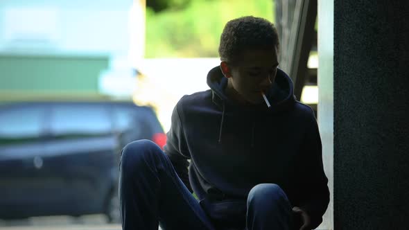 Black Guy Looking for Lighter Deciding to Smoke, Person Lighting His Cigarette