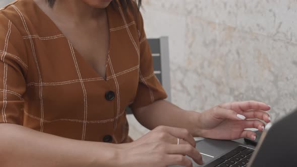 Woman Using Laptop Outdoors