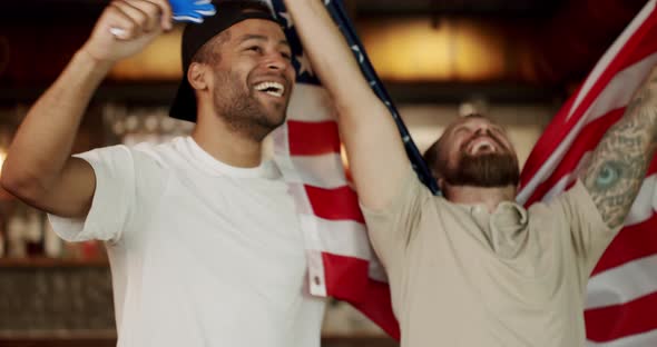 Friends at the Bar in a Pub Having Fun