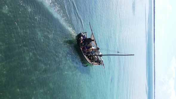 Vertical Video Boats in the Ocean Near the Coast of Zanzibar Tanzania Aerial View