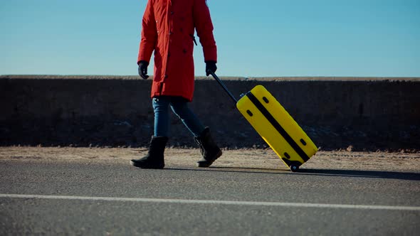 Wife Left Her Husbands After Quarrel.Traveler Transportation With Suitcase. Holiday Vacation Weekend