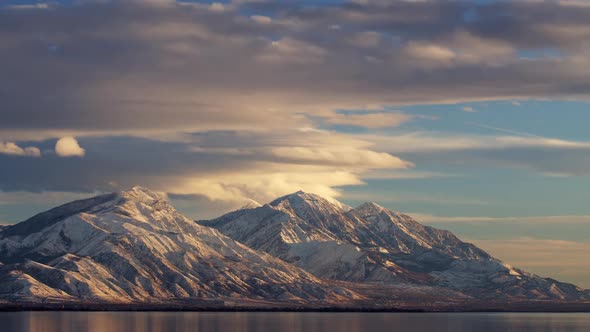 Time lapse over snowcapped mountain range looking at Mt. Nebo