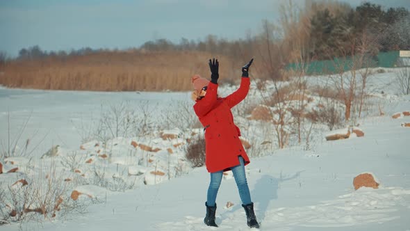 Winter Fun And Leisure Vacation In Weekend Adventure Trip. Woman In Red Parka Jacket Enjoying Winter