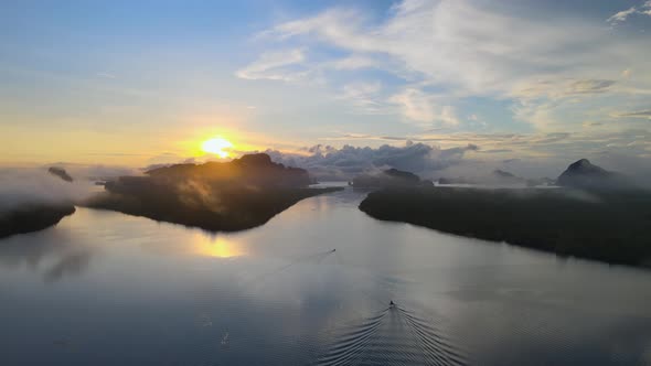 Aerial view in perspective of sunset sunrise. Over river and misty cloud in river mountain and sky