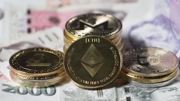 Ethereum and other cryptocurrency coins stacked on Czech banknotes.