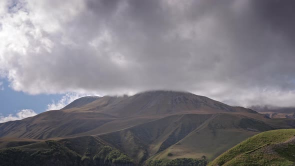 Timelapse of epic clouds and mountains