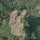Top View of Two Hikers on Top of a Rock Mountain in the Siberian Forest - VideoHive Item for Sale