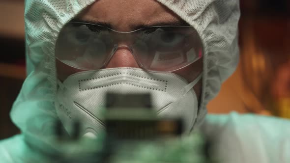 Man Holding Microchip Closeup