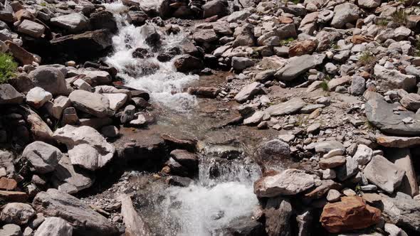 Rapids Flowing Over Large Rocks Of Valleys Near Stausee Wasserfallboden In Kaprun, Austria. - Tracki