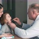 Male doctor examining girl's throat - VideoHive Item for Sale