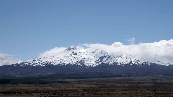 Time lapse of Mount Ruapehu cutting through clouds in New Zealand.