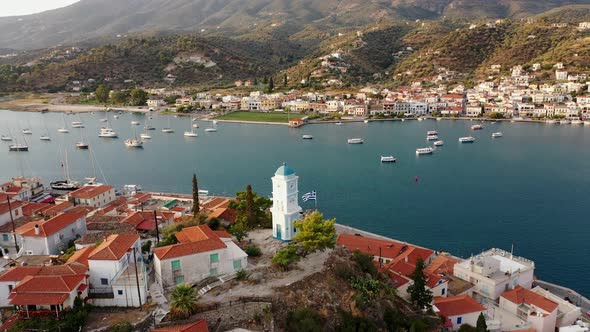 Aerial View of Poros Old Town and Marina or Seaport Greece  Drone Videography