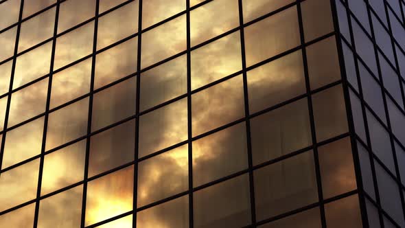 Clouds Reflect in Modern Brown Building with Square Windows