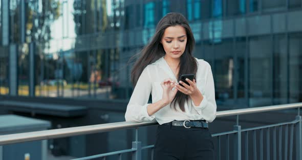 Beautiful Smiling Woman Working in Company Comes Out for Break Dressed in Elegant Outfit Stands