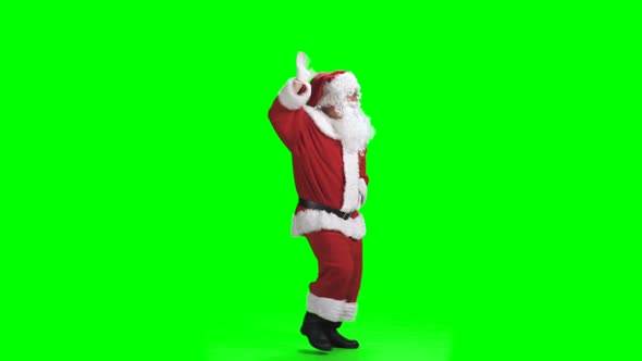 Merry Christmas. Dancing Santa Claus In Full Growth In Red Suit