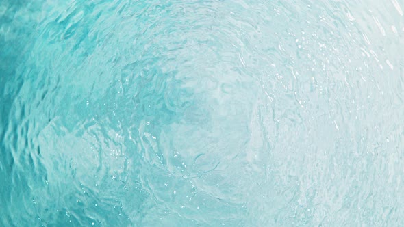 Super Slow Motion Shot of Clear Water Surface Waving Over White Sand Beach at 1000Fps alt