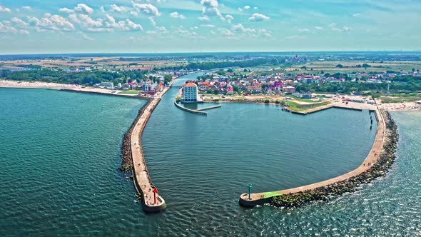 Entrance to the port in Darlowek in summer, Baltic Sea