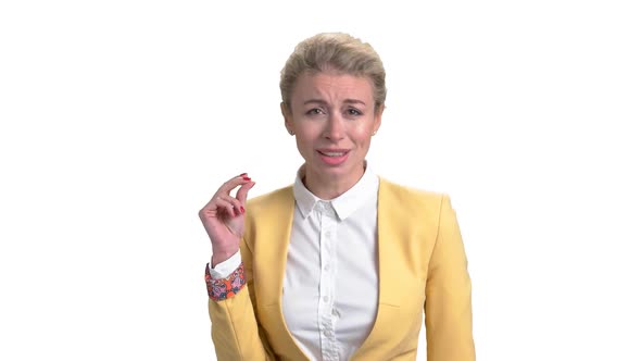 Mature Woman in Business Suit Listening To Music