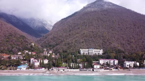 Mountains and sea. Lovely landscape. Blue sea water. Palm trees and sea.