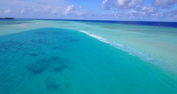 Tropical flying island view of a paradise sunny white sand beach and blue sea background in hi res 4