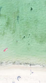 Vertical Video Boats in the Ocean Near the Coast of Zanzibar Tanzania