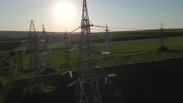 Aerial View of High Voltage Power Lines at Sunset