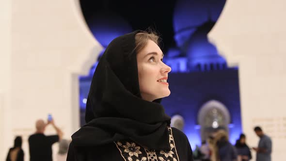 Smiling Girl Admires the Mosque