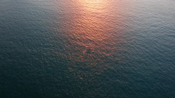 Aerial View of a Beautiful Bay with Wide River and Reflecting Sunshine