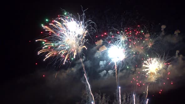 Colorful Firework display at night on sky background