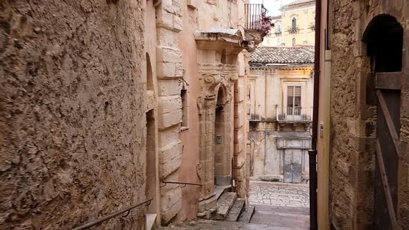 POV Moving Along the Narrow Street in Ragusa Old Town in Sicily, Italy