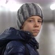 Portrait of Alone Confident Boy in Hat and Jacket in Underground Covered Walkway in City at Winter - VideoHive Item for Sale