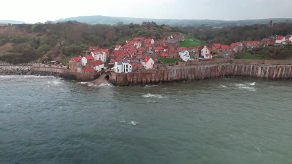 Coastal Fishing Village Of Robin Hood's Bay In North Yorkshire, England. Aerial Drone Shot