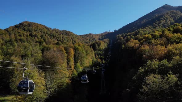 Exciting Aerial View on Funicular Cabins Moving on the Cable Road