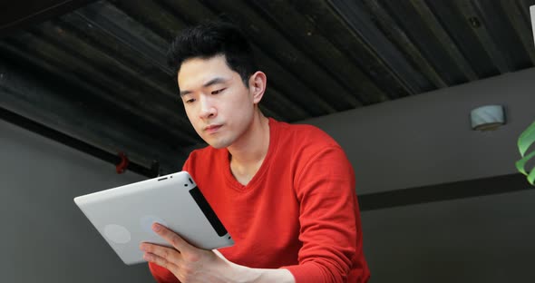 Man Using Digital Tablet in Balcony 4k